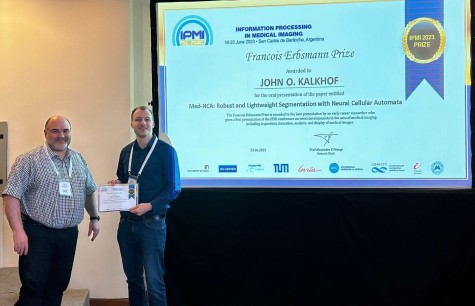 IPMI23 John Kalkhof Erbsmann Prize handover