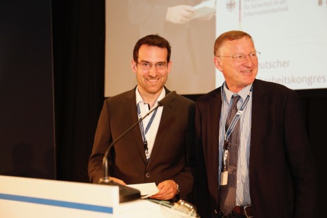 Preisträger Dr.-Ing. Matthias Schulz mit Prof. Dr. Rüdiger Grimm (Gesellschaft für Informatik) (Bildnachweis: Bundesamt für Sicherheit in der Informationstechnik).